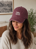 Dog Mom burgundy paw print embroidered baseball cap for dog lovers
