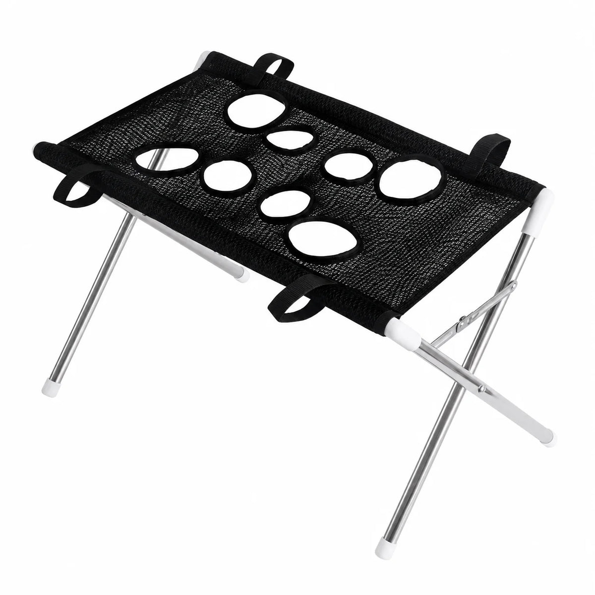 A portable folding camp stool with a black mesh seat featuring circular cutouts, supported by a silver metal frame with white plastic joints and handles, shown on a plain white background.