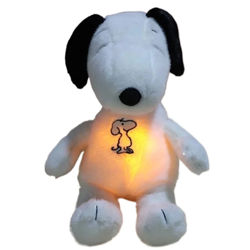 Plush dog toy with glowing chest featuring a small cartoon character on a white background