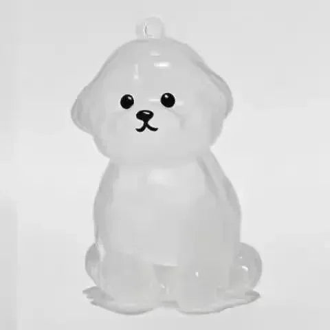 Clear plastic seal-shaped ornament on a white background