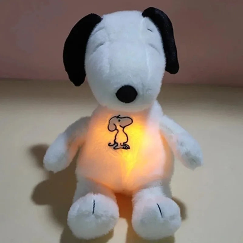 Plush dog toy with glowing belly featuring a cartoon character on a plain background