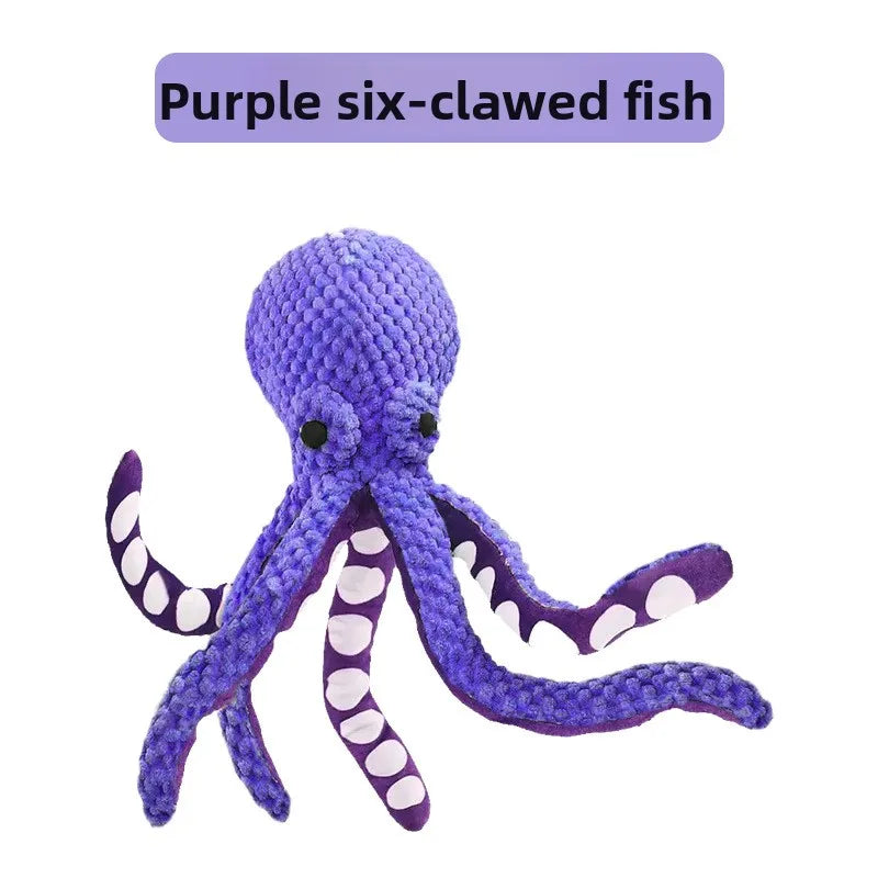Purple plush octopus toy with six claws on a white background