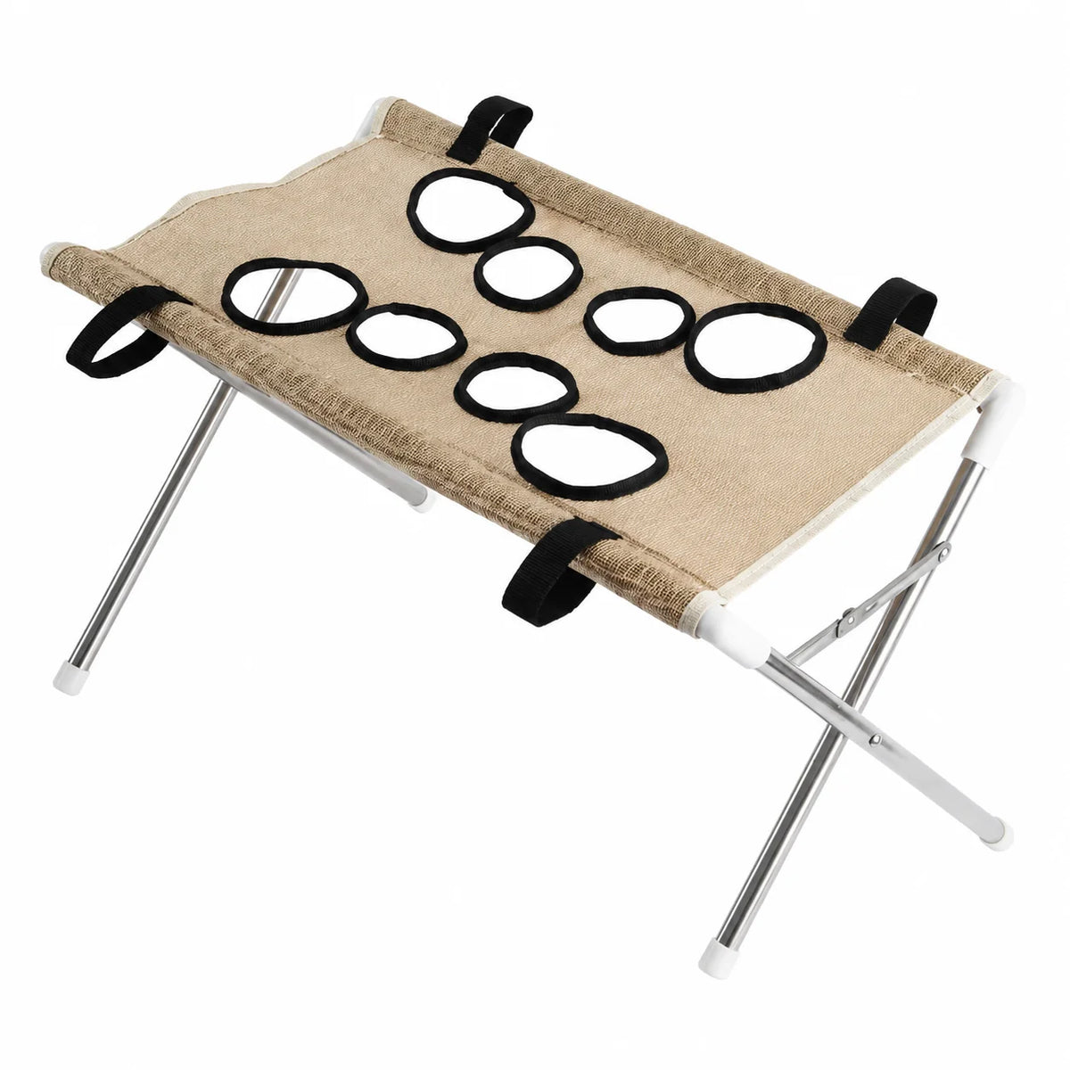 A portable folding pet cot with a beige woven fabric bed, silver metal legs, white corner supports, and black straps holding six black-framed circular window cutouts.